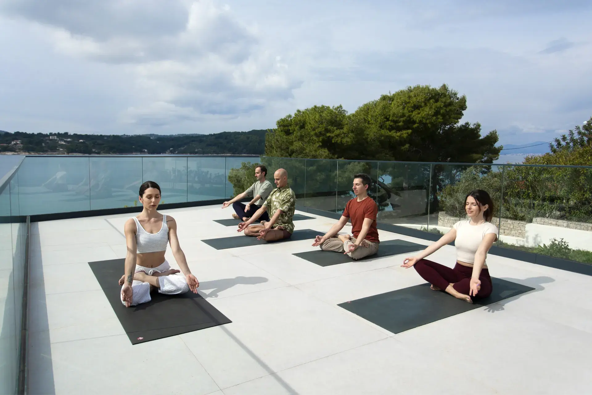 Headstand practice during retreat morning session