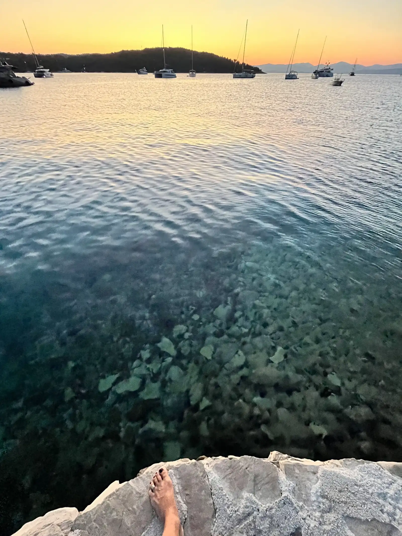 Sunset yoga on Šolta island coastline